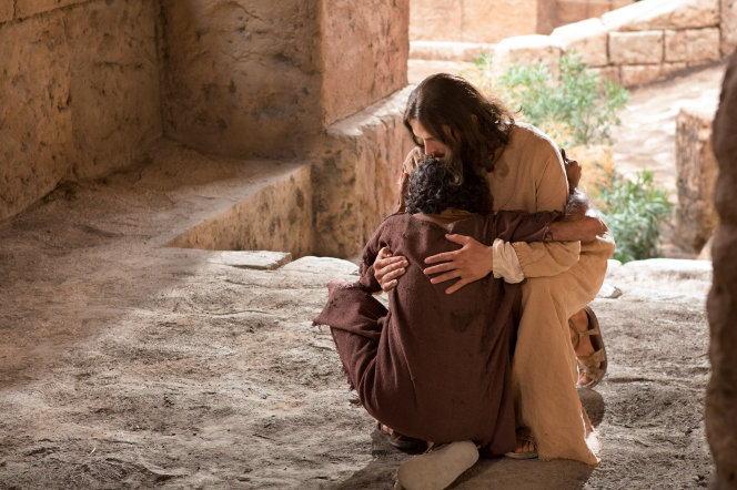 John 9:1–41, A previously blind man hugging Christ after he is healed