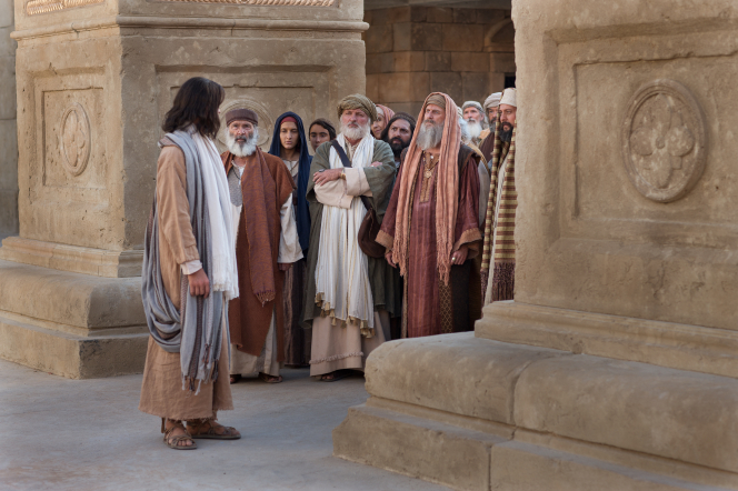 Juan 8:12–58, En el templo, Jesús se pone en pie y habla con los fariseos