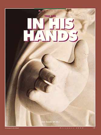 A photograph of the hand of a white marble Christus statue, paired with the words “You Are in His Hands.”