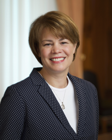 A formal portrait of Sharon Eubank wearing a black blazer.