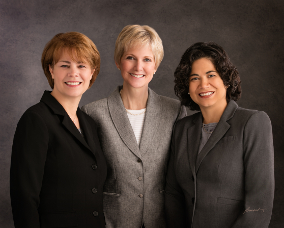 A formal portrait of the General Relief Society Presidency.