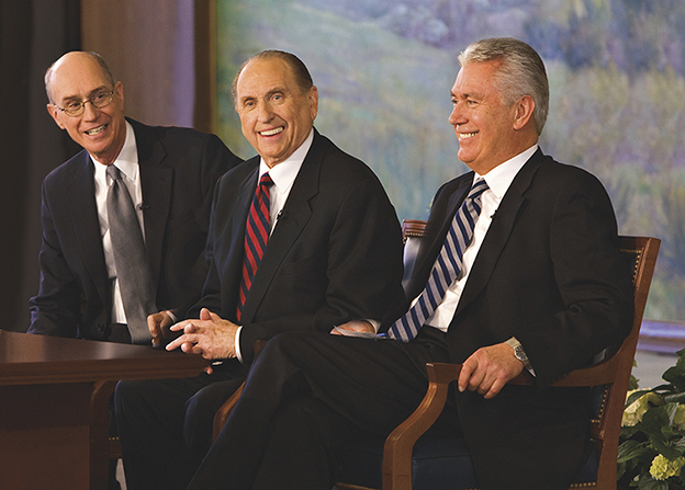 An informal portrait of President Thomas S. Monson, President Dieter F. Uchtdorf, and President Henry B. Eyring wearing suits and ties and smiling.