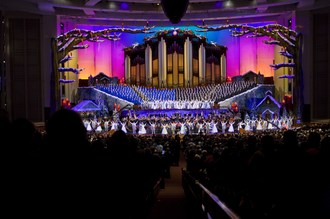 A scene from the 2010 Christmas concert with the Mormon Tabernacle Choir singing in the back and dancers in the front.
