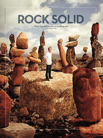 A conceptual photograph showing a young man standing on a large rock surrounded by stacks of boulders, paired with the words “Rock Solid.”