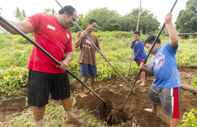 Fanguna family planting crops