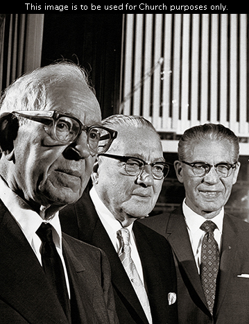 Joseph Fielding Smith standing with his two counselors in the First Presidency, Harold B. Lee and N. Eldon Tanner.