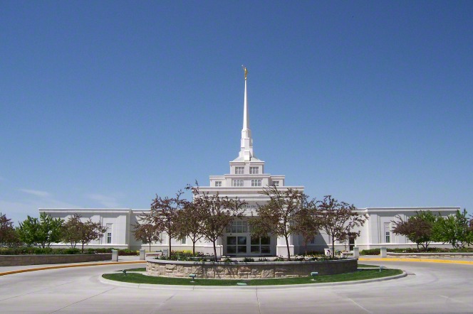 The front of the Billings Montana Temple, including the large flower bed in the roundabout in front of the temple.